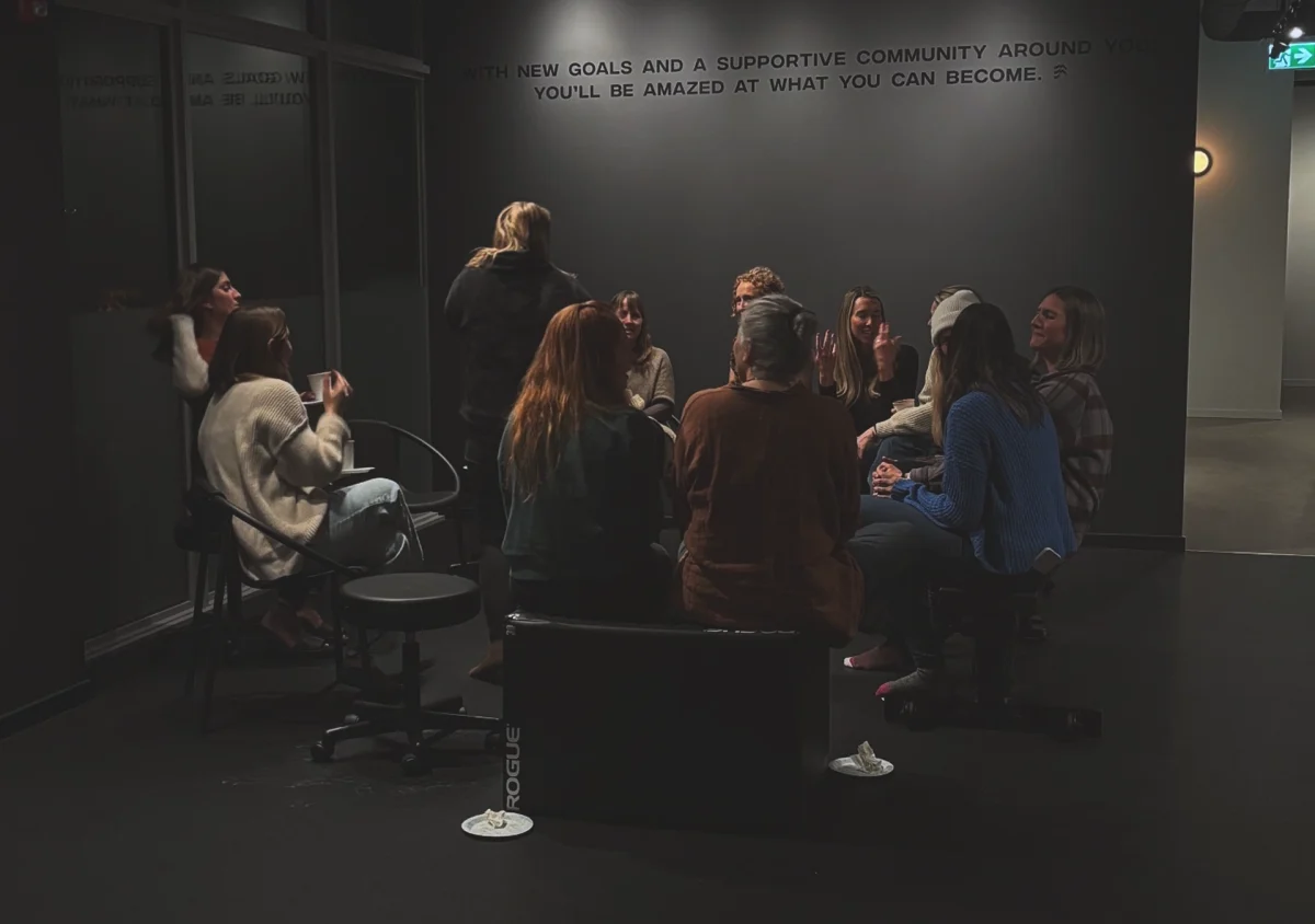 A group of Squamish therapists gathered in a cozy space, engaging in conversation and sharing experiences.